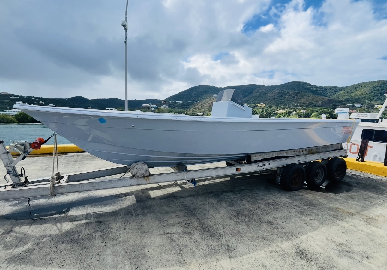 Top Shot's 2025 27ft Deep V hull on the trailer in St. Croix